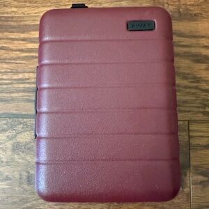 Away Mini in color “Brick”